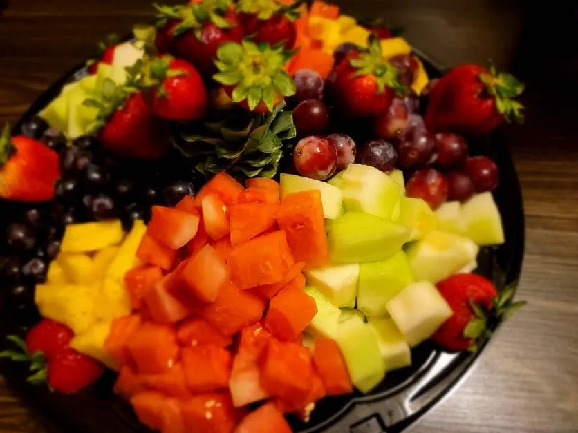 Fresh cut fruit platter with berries and melon